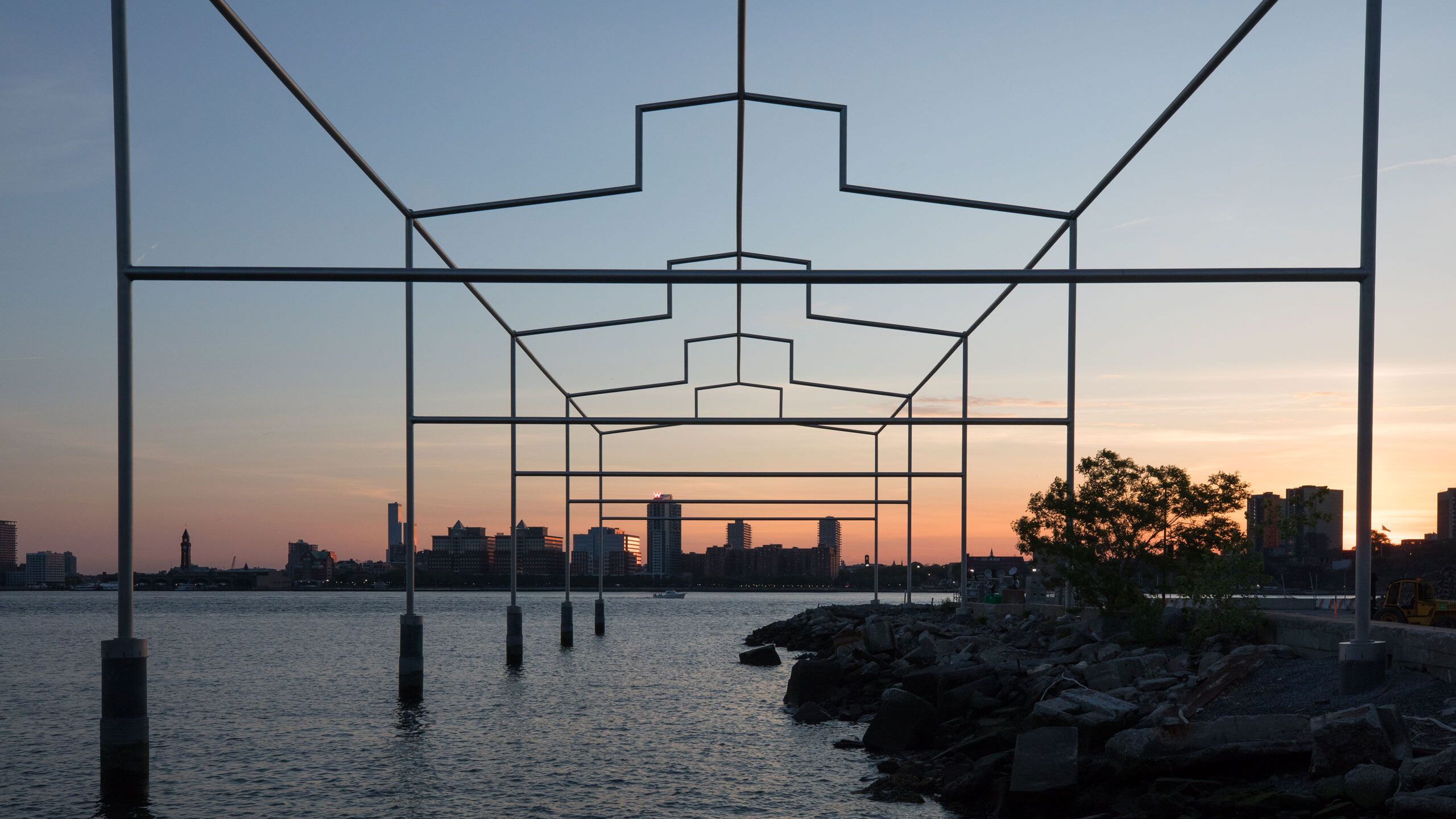 Day's End by David Hammons, a gift from the Whitney Museum, sits on the Hudson River at sunset